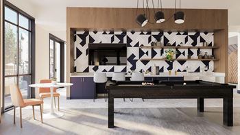 a living room with a pool table and a geometric wallpaper