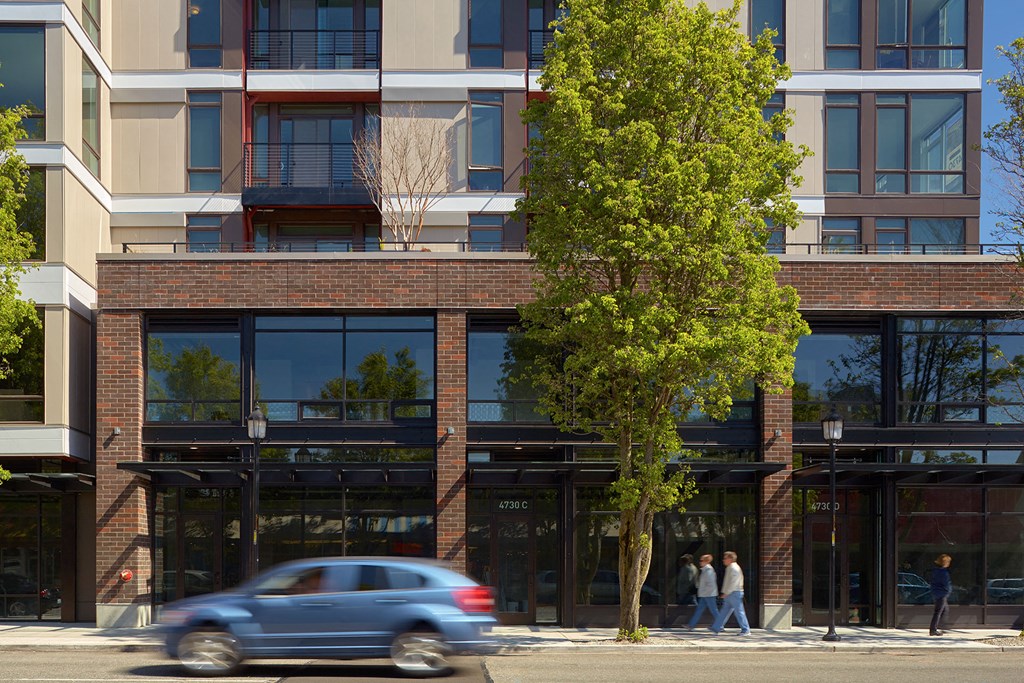 4730 California Apartments Building Exterior and Street