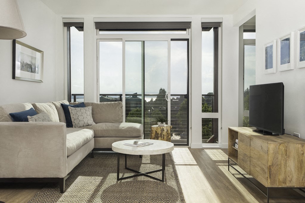 4730 California Apartments Model Living Room Floor-to-Ceiling Windows