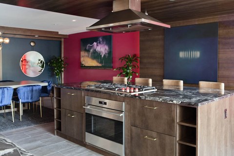 a kitchen with a stove and a counter top
