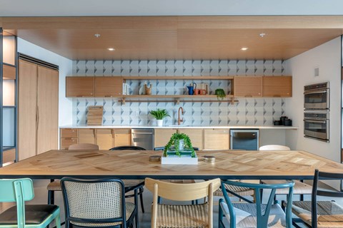 a kitchen or kitchenette with a table and chairs