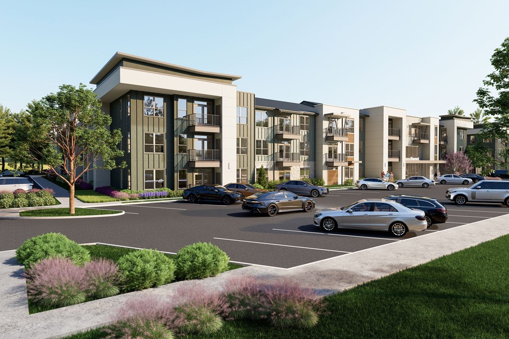 a rendering of an apartment complex with cars in a parking lot
