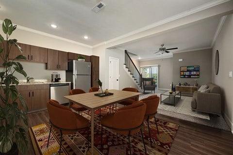 an open living room and kitchen with a dining room table and chairs