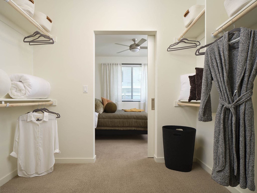 the ceiling of a closet with ropes hanging from it