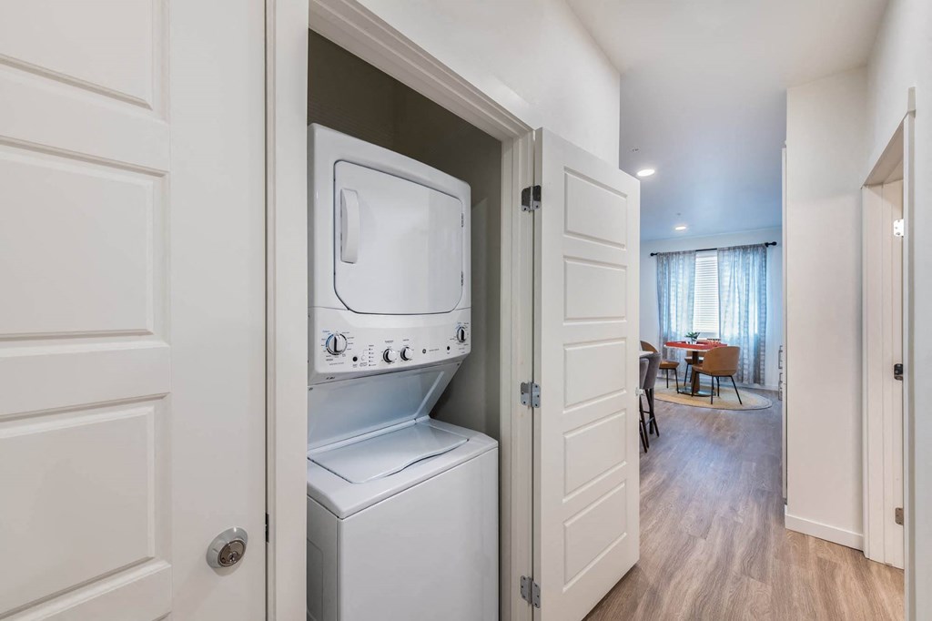 a laundry room with a washer and dryer in a closet