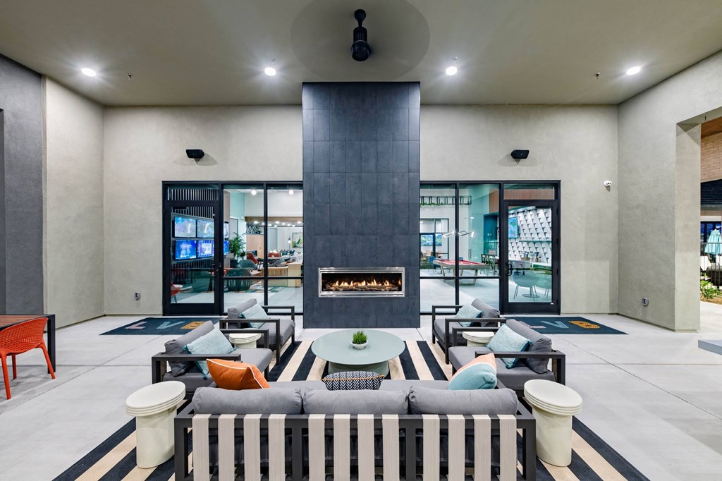 a living room with a couch and a fireplace