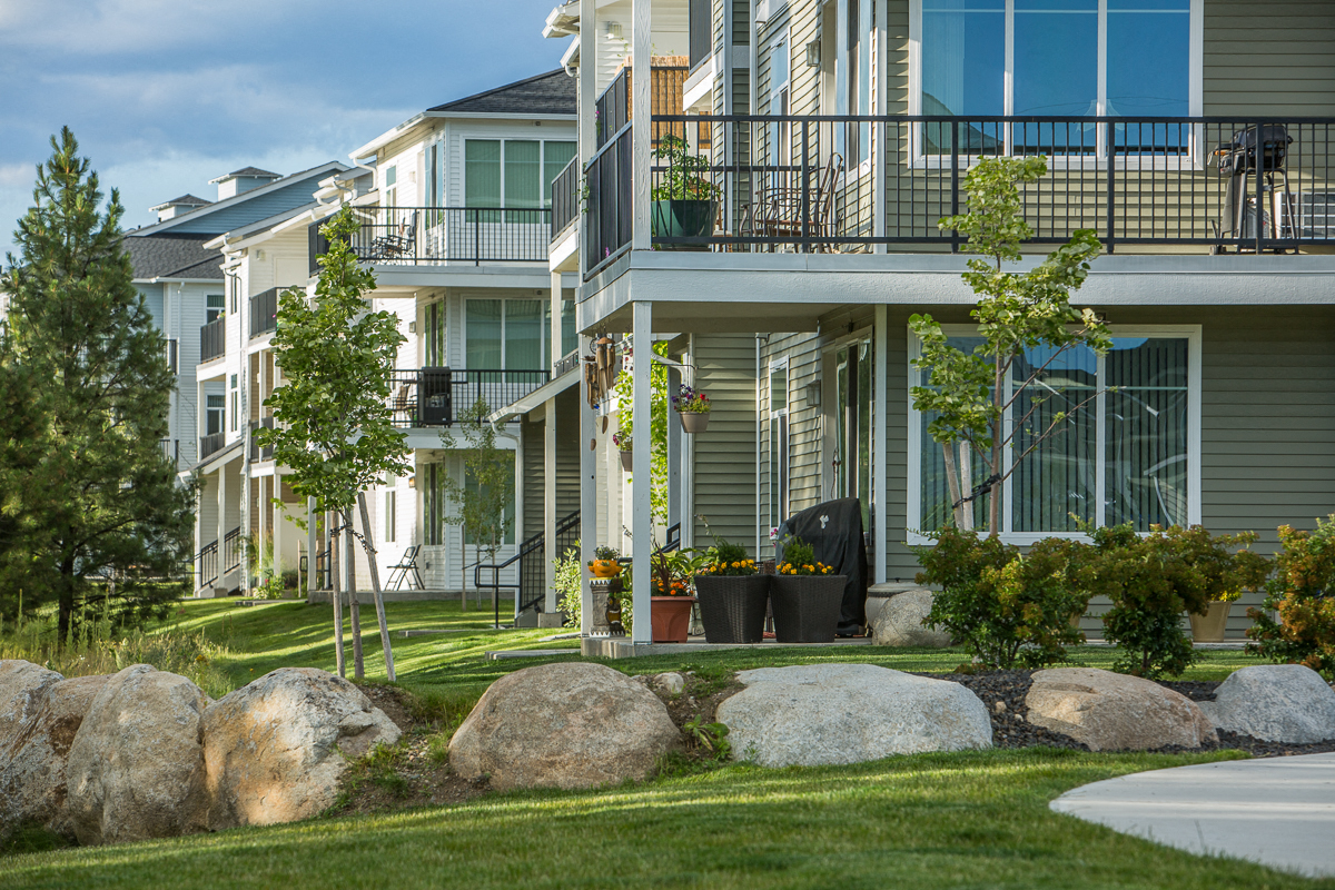 River House Apartments Building Exterior and Green Grass