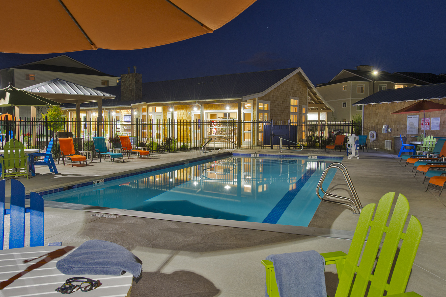 River House Apartments Pool Area and lounge chairs