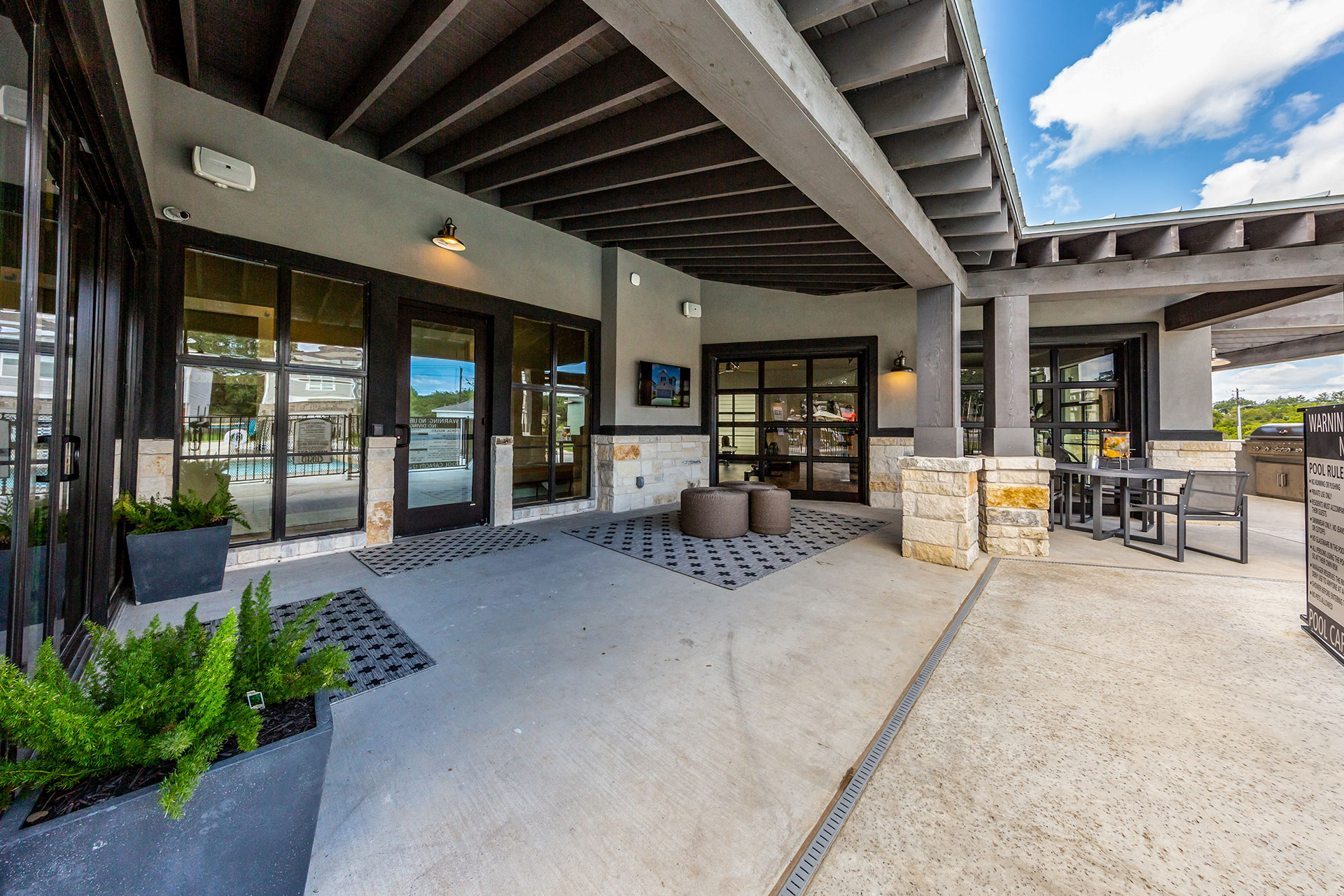 Rivers Edge Apartments Patio Seating with Barbecue Grills