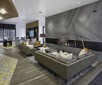 Community-Clubhouse The Aviary Clubhouse Seating Near Fire Place - Photo Gallery 5