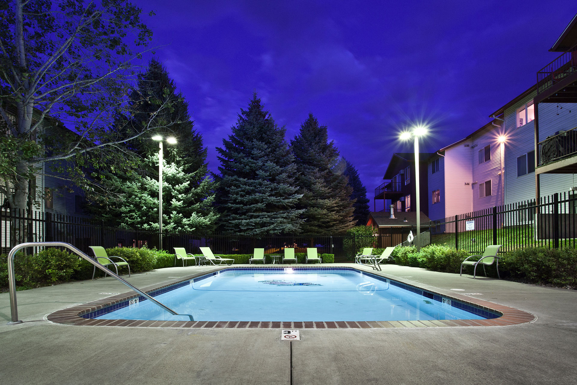 Whimsical Pig Apartments Pool Deck