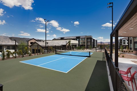 the tennis court at the club at highlands apartments