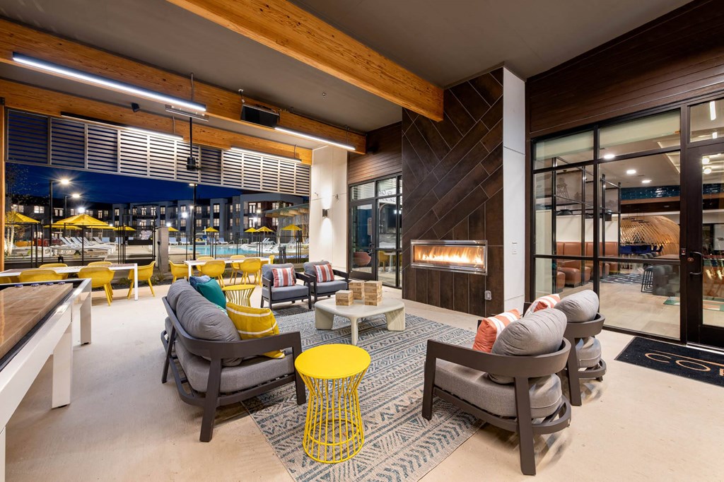 Corsair Apartments Patio Seating with Fireplace
