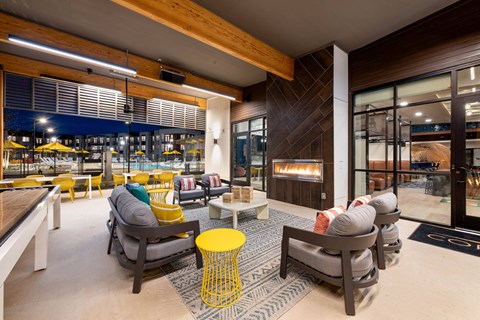 Corsair Apartments Patio Seating with Fireplace