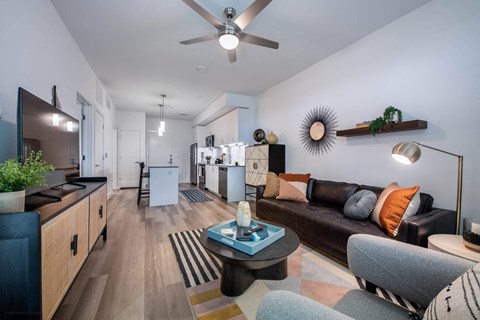 a living room with a couch and a table