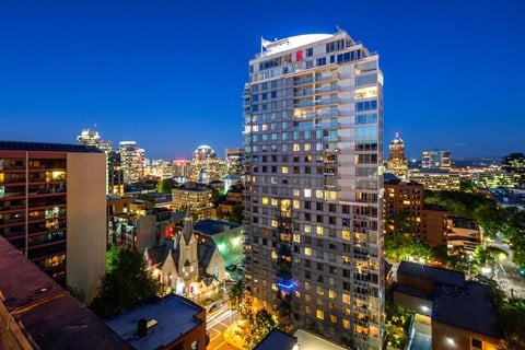 a view of the city from a high rise building at night
