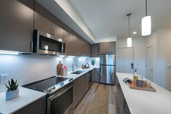 Quartz Countertops & Subway Tile Backsplashes