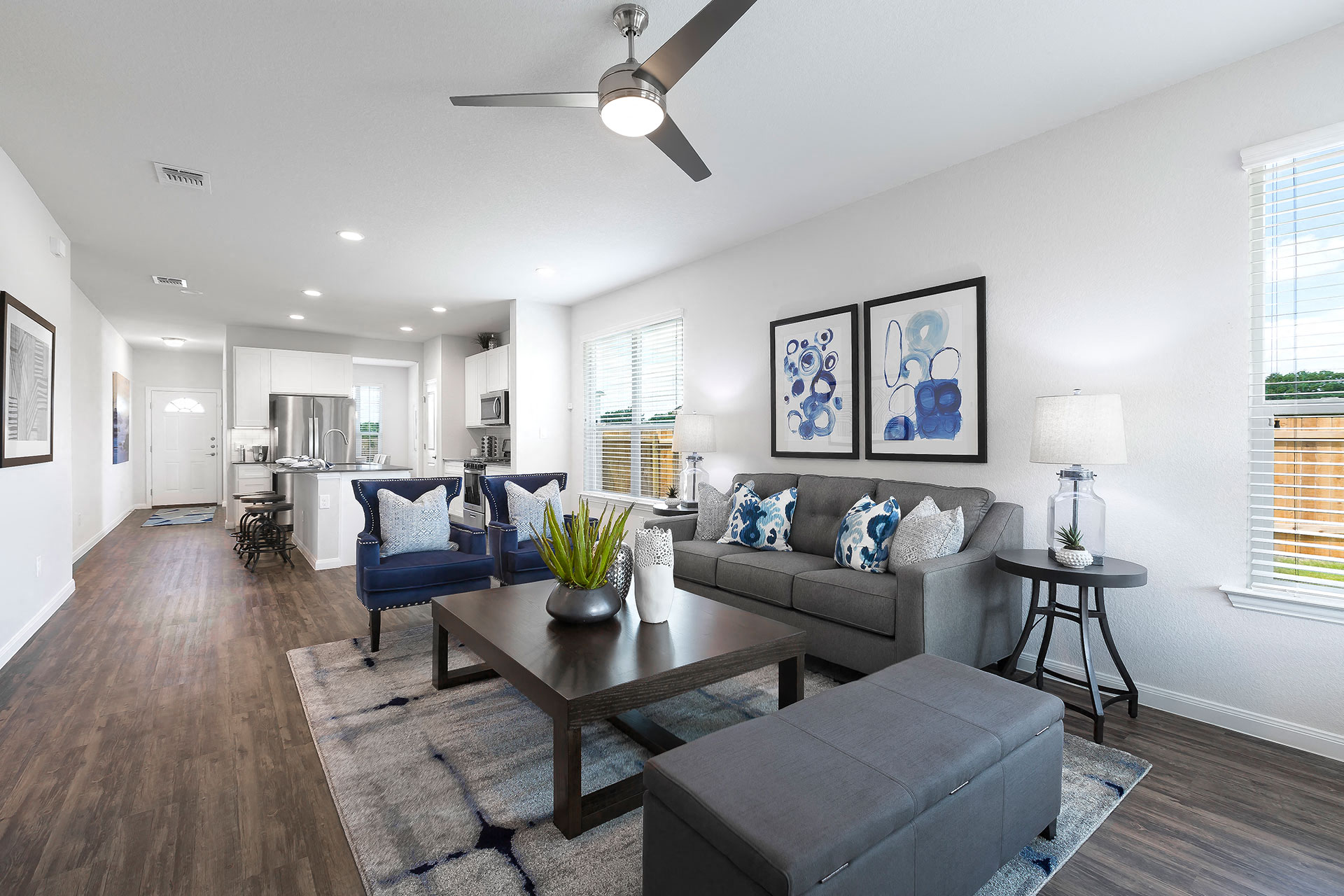 a living room with couches and a coffee table