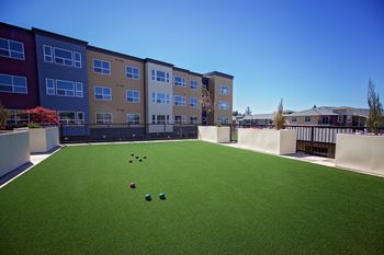 Putting green and bocce ball court