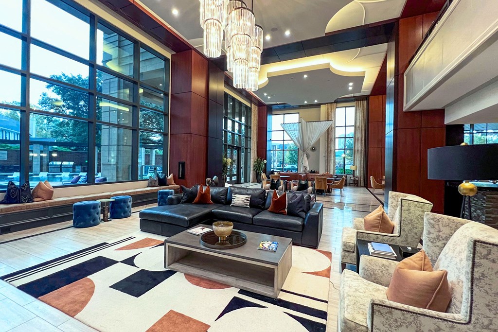 a large lobby with couches and a coffee table
