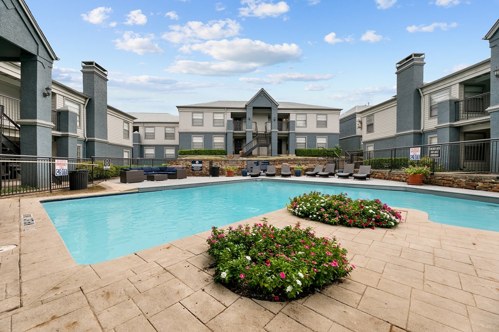 the swimming pool at the falls at rolland park apartments