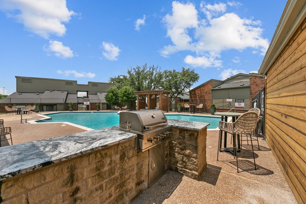 our apartments offer a clubhouse with a pool at The Hills at Ironhorse, North Richland Hills, 76180