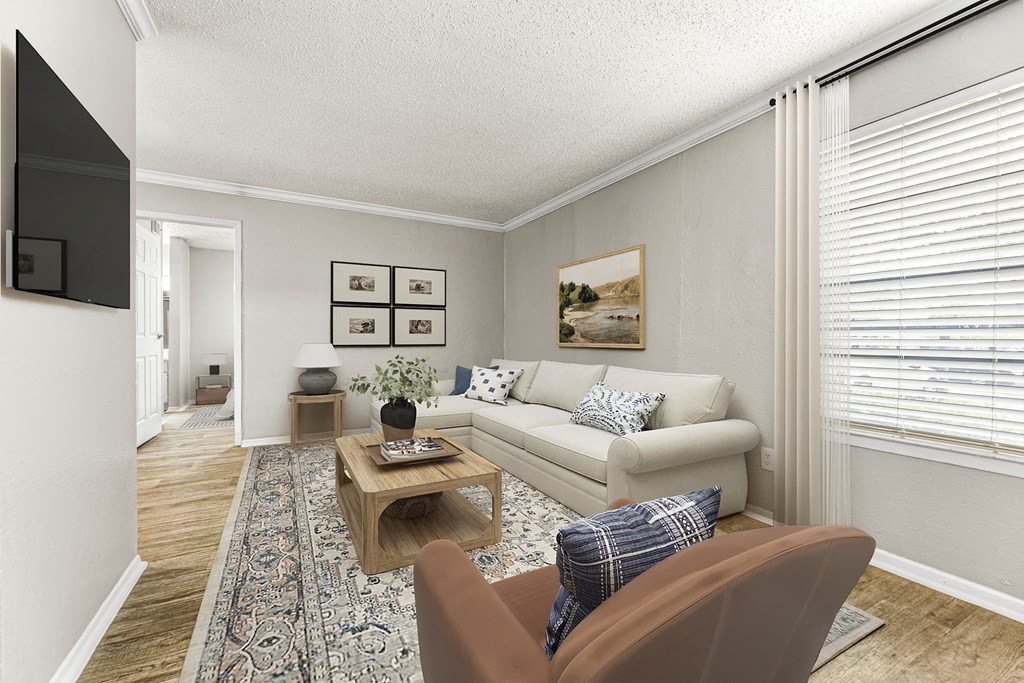a living room with a couch and a coffee table