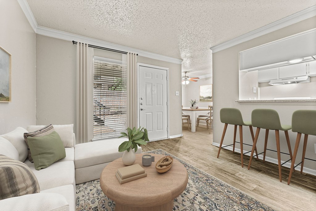 a living room with a couch and a table