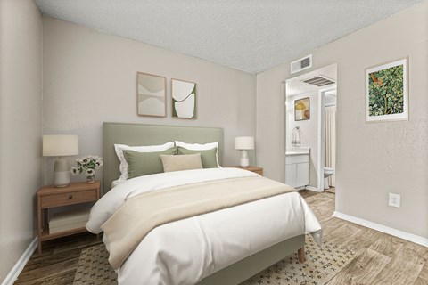 a bedroom with a large bed and a closet at 5636 Apartment Homes, Dallas, Texas