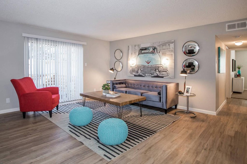 a living room with a couch and a table