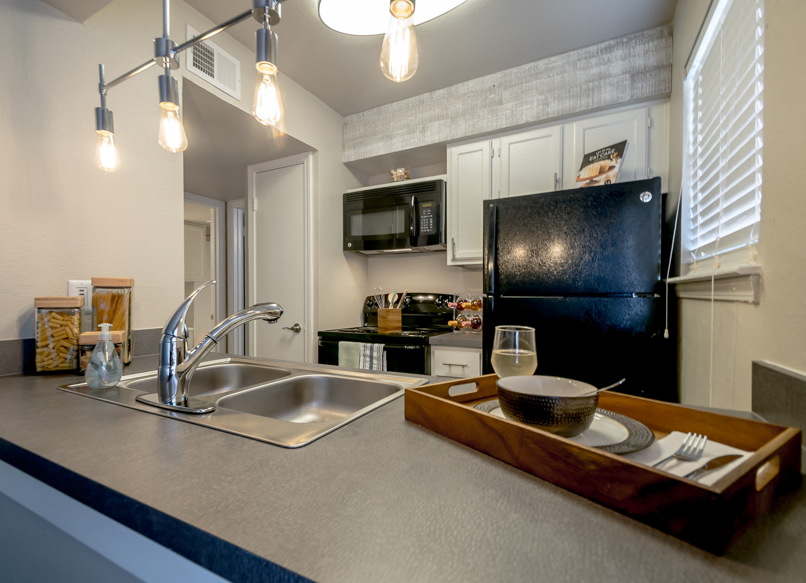 Kitchen With Refrigrator at The Hamptons, Texas