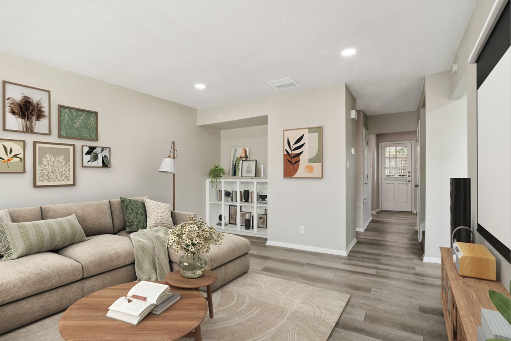 a living room with a couch and a table