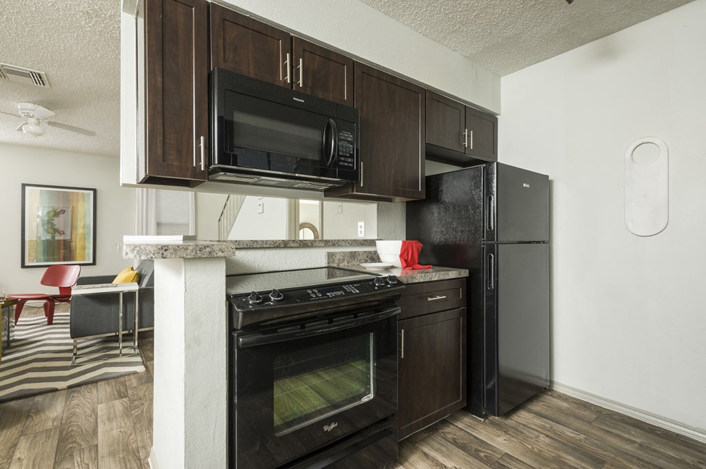 Classic Kitchen with Black Appliances  at Maxwell Townhomes, San Antonio, 78230