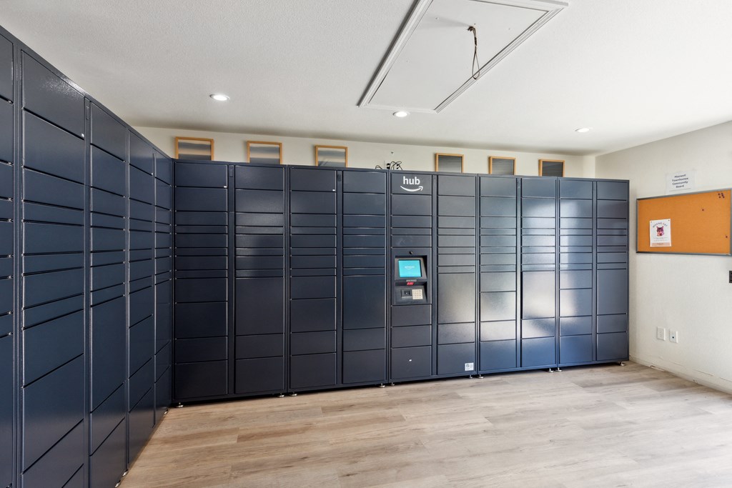 a row of lockers in a room with a wooden floor at Maxwell Townhomes, San Antonio, TX
