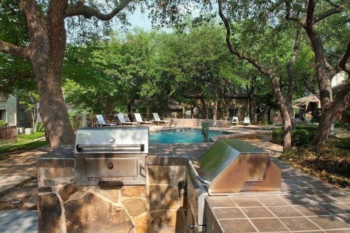 Swimming Pool w/ Outdoor Grilling Center at Carmel at Deerfield in San Antonio, TX