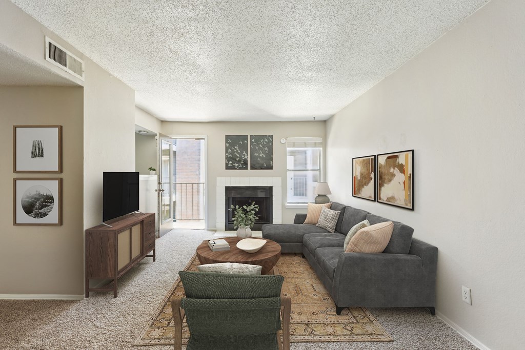 Living room with couch at The Hamptons, Dallas, 75287