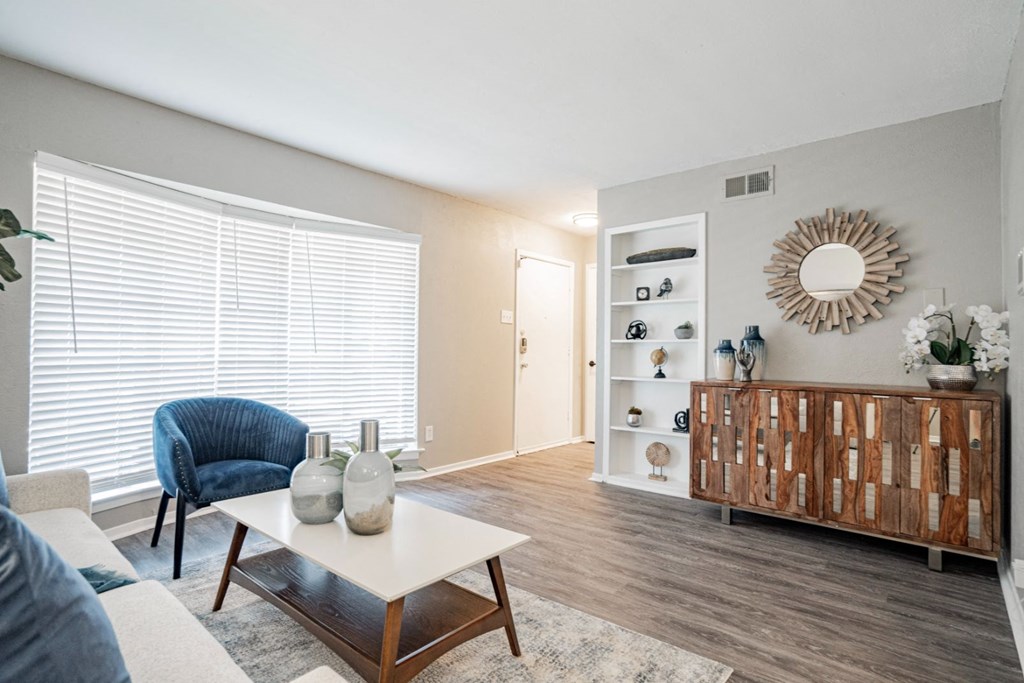 a living room with a couch and a coffee table at Aero White Rock, Texas