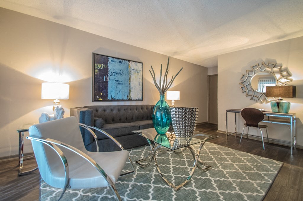 a living room with a couch and a table