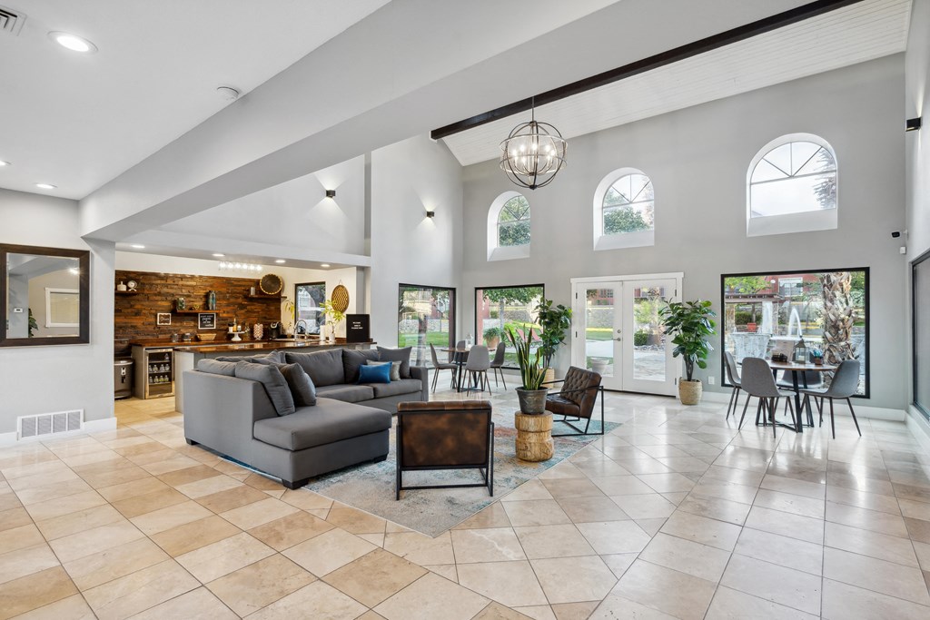 the living room is open to the dining room and kitchen