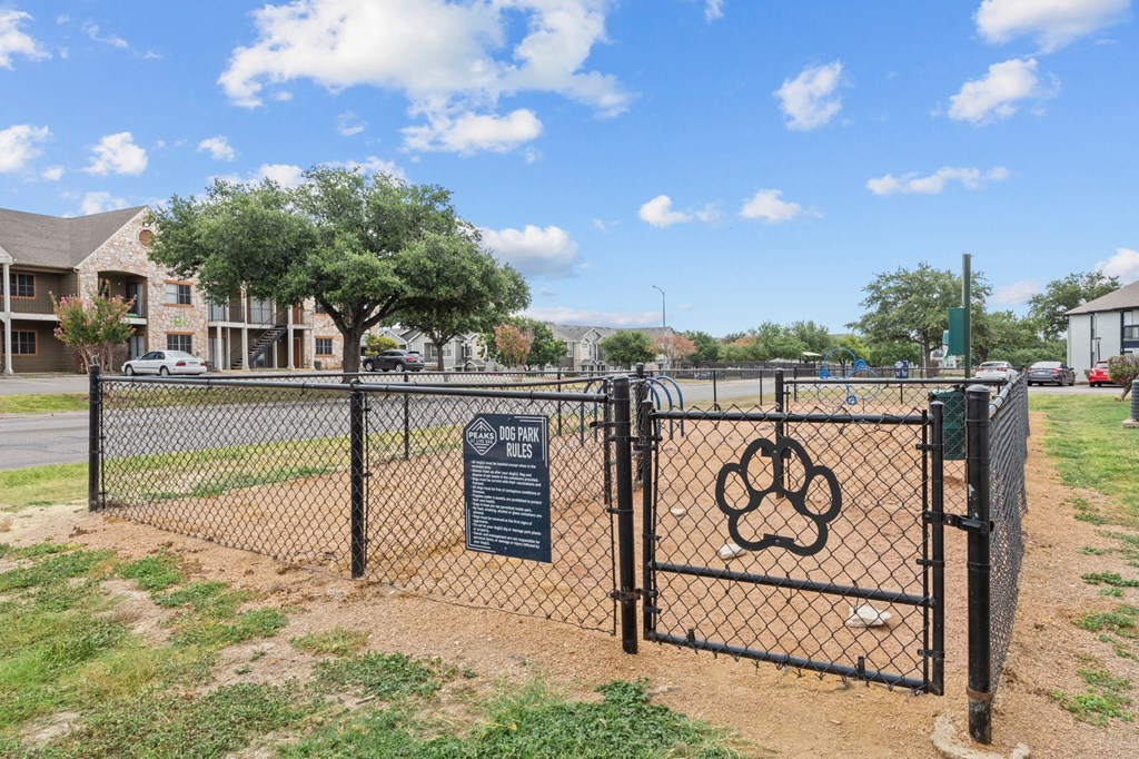 our apartments showcase a dog park with kennel and agility courses