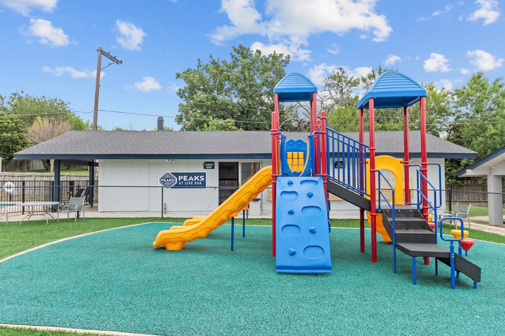 the playground at the whispering winds apartments in pearland, tx