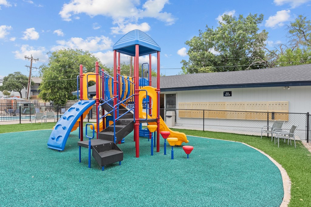 the playground at the whispering winds apartments in pearland, tx