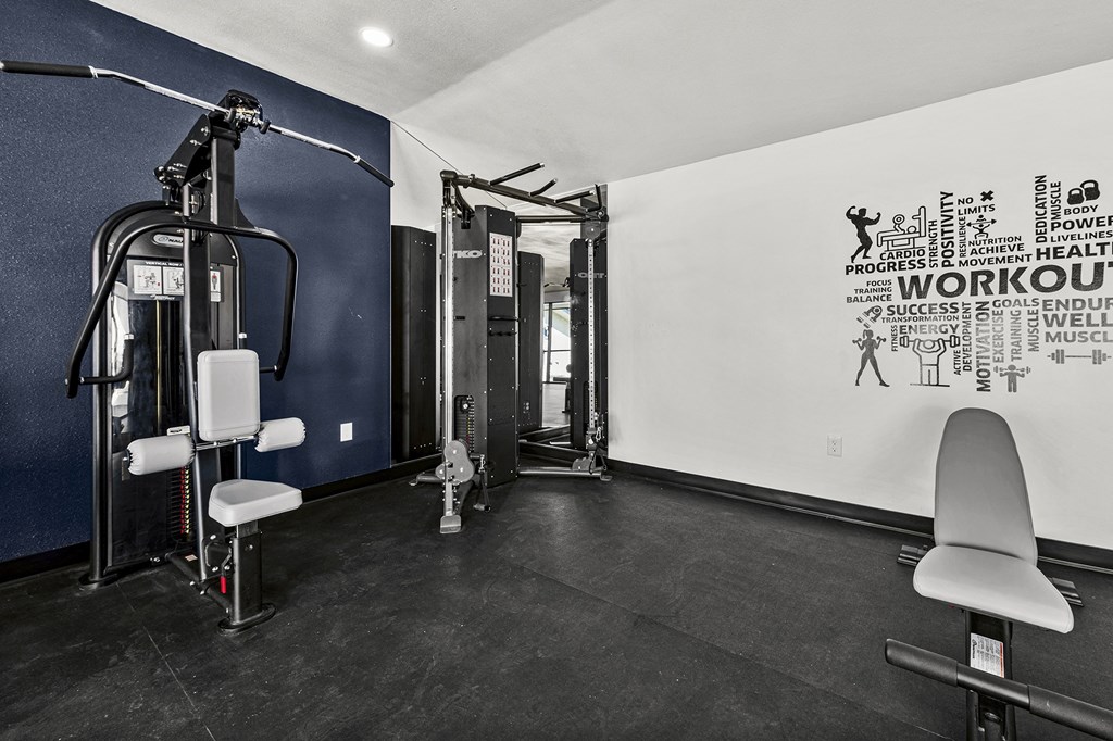 a gym with exercise equipment at Peaks at Live Oak in San Antonio, TX