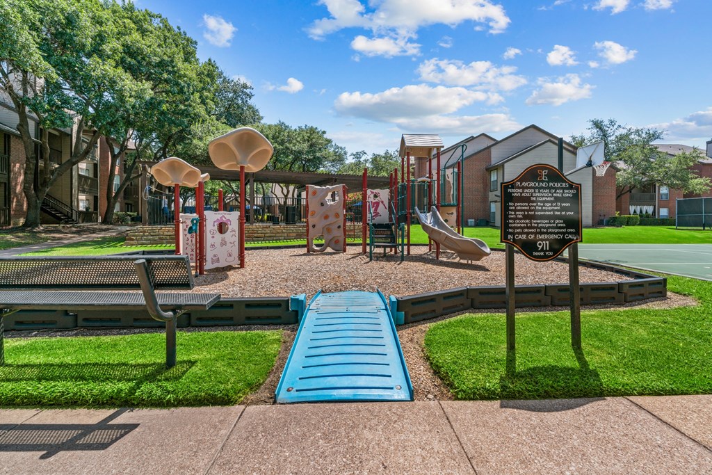 a playground with a slide and other play equipment