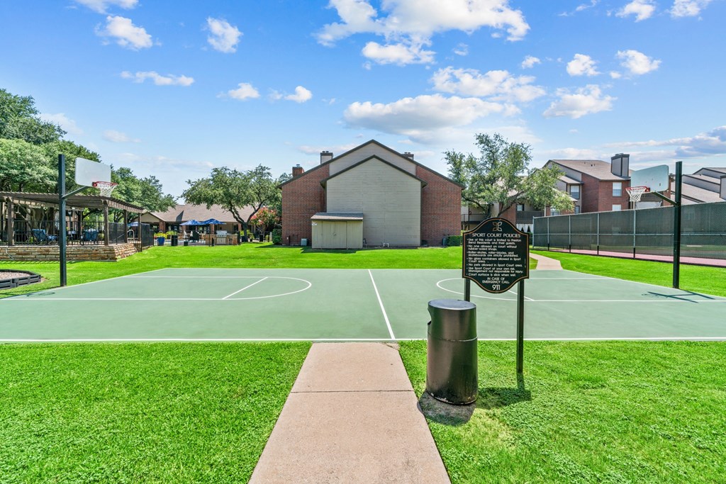 basketball court at the whispering winds apartments in pearland, tx