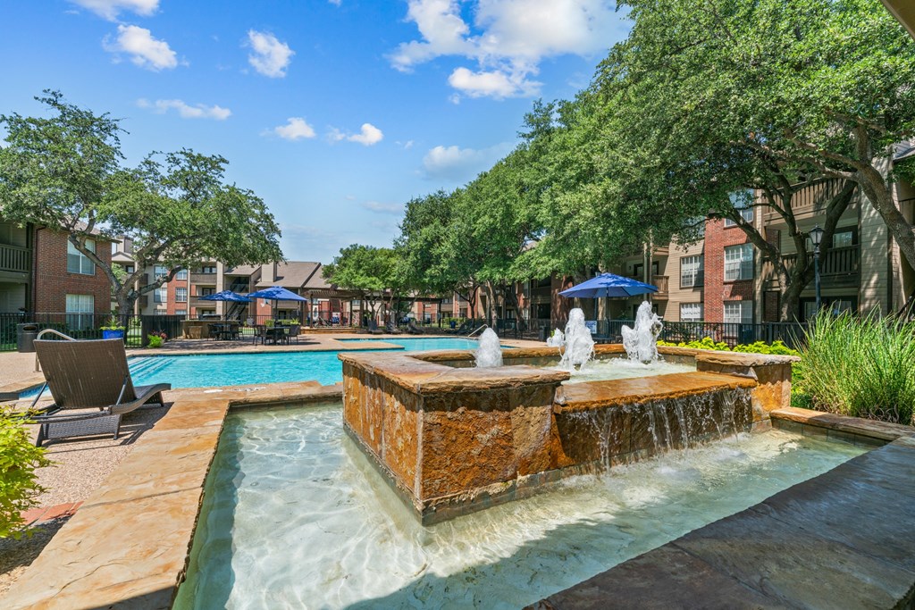 a fountain in front of a building