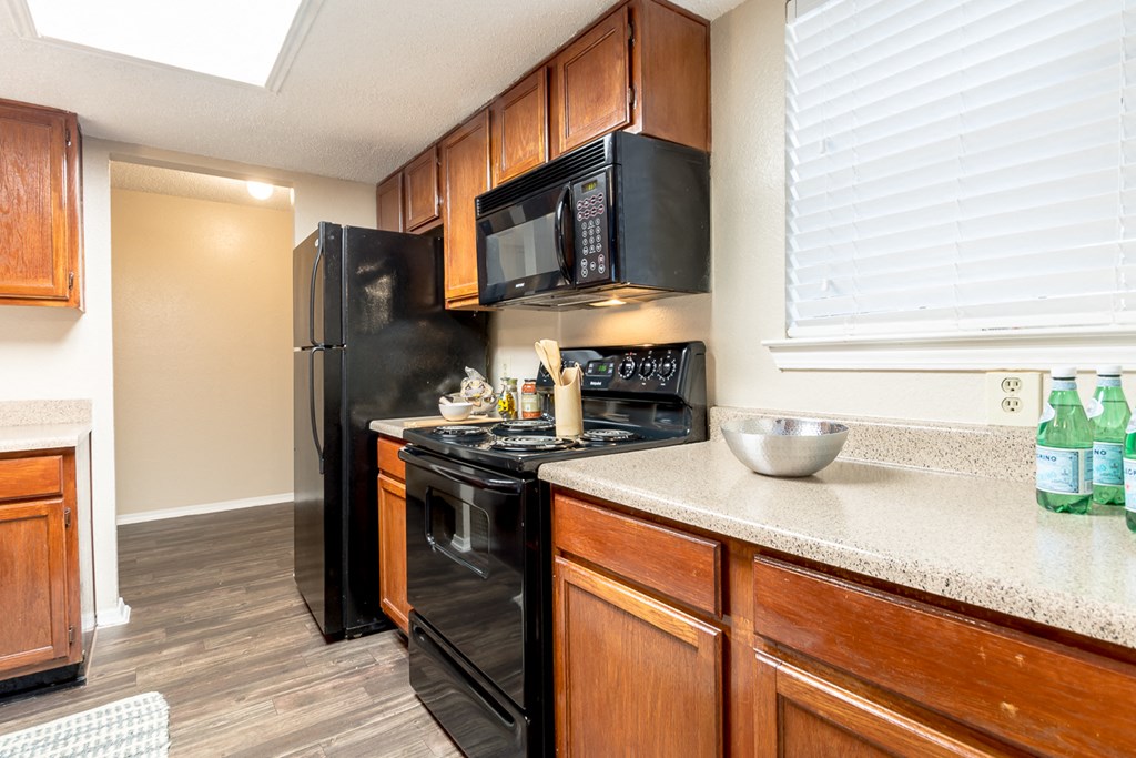 Wooden cabinets at Amberly Village Townhomes, Garland, Texas