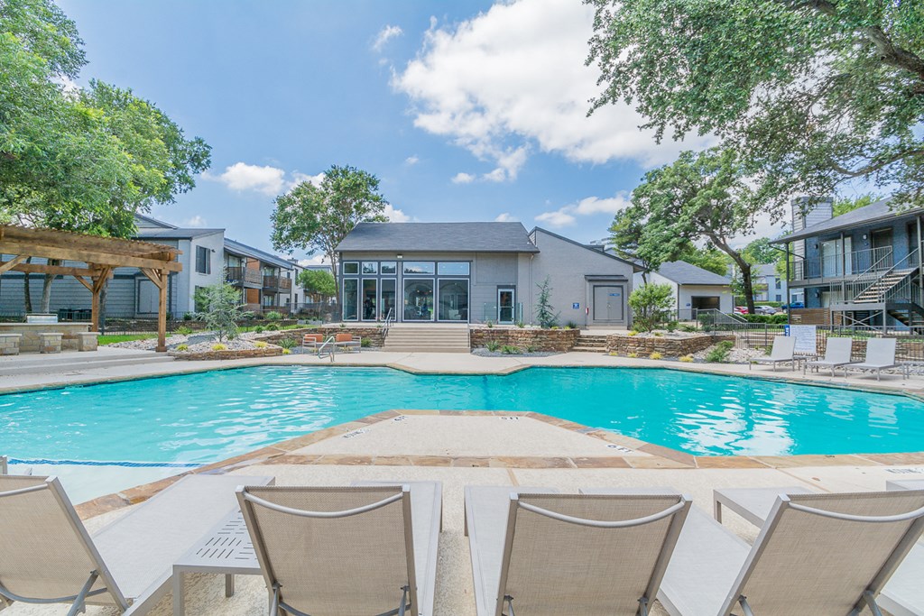 the preserve at ballantyne commons swimming pool with chairs around it