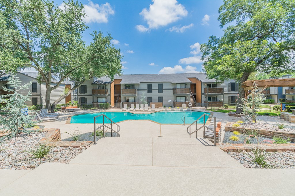 the preserve at ballantyne commons pool and community buildings with trees