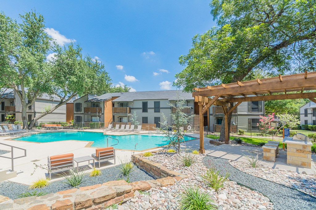 the preserve at ballantyne commons pool and spa with apartment buildings